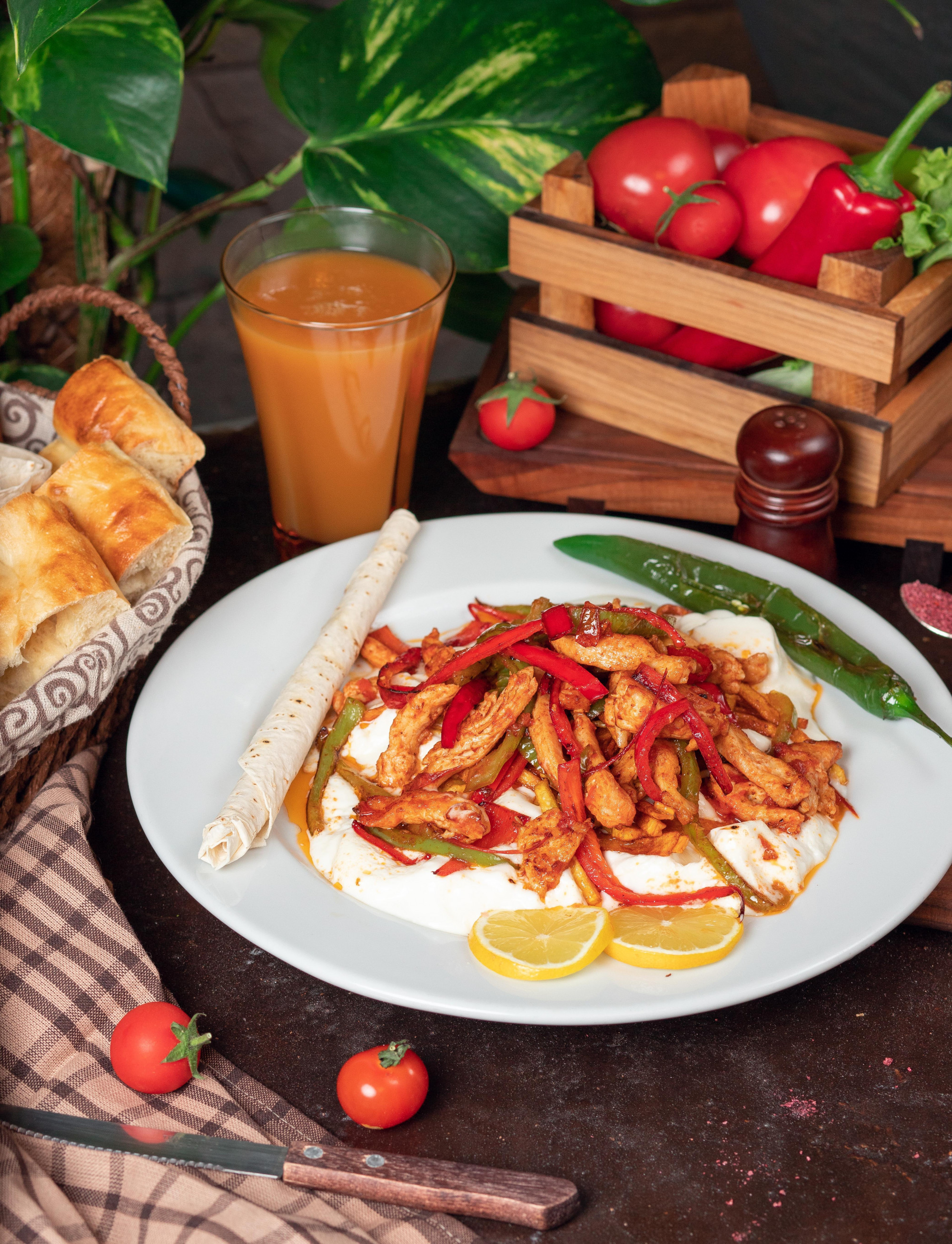 chicken-fajita-chicken-fillet-fried-with-bell-pepper-lavash-with-bread-slices-white-plate